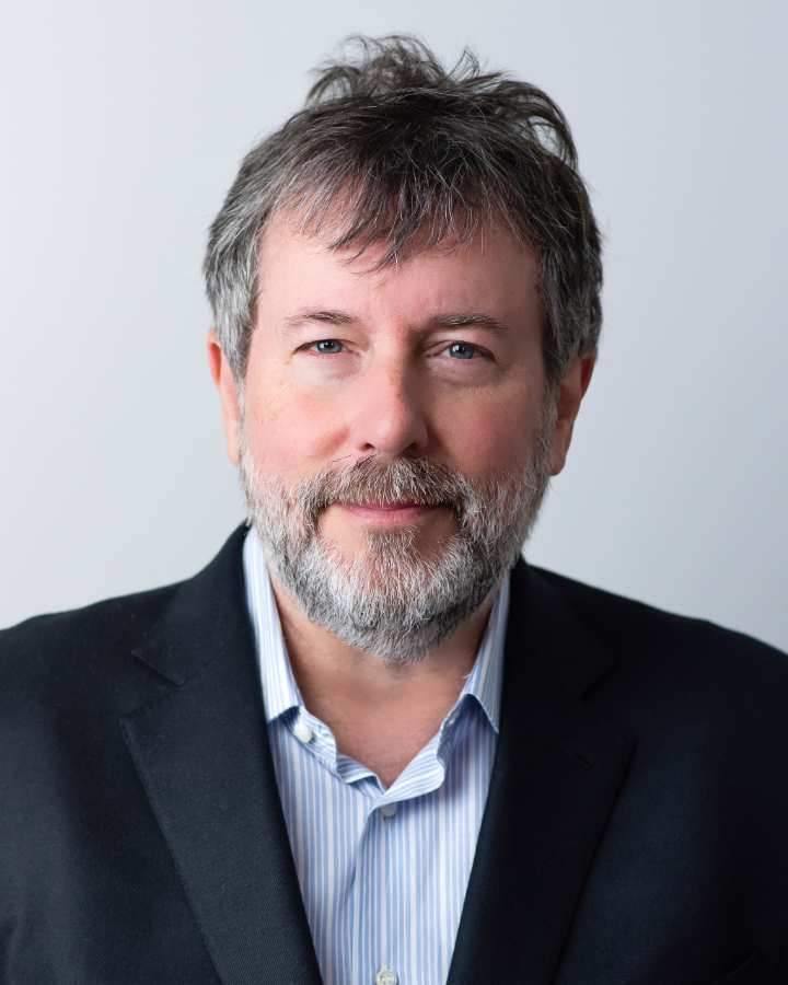Portrait photograph of Russ Hudson